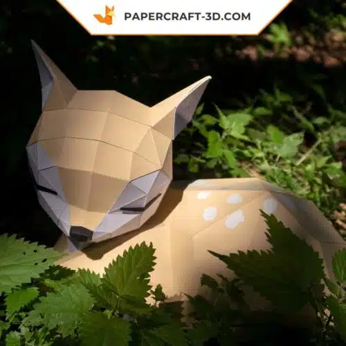 Papercraft of sleeping fawn lying in 3D origami