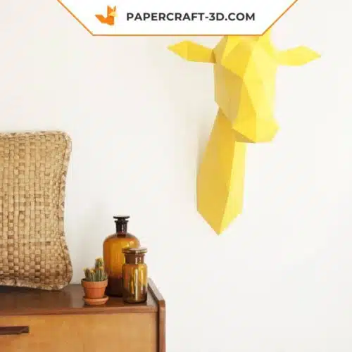 Papercraft giraffe head in wall origami