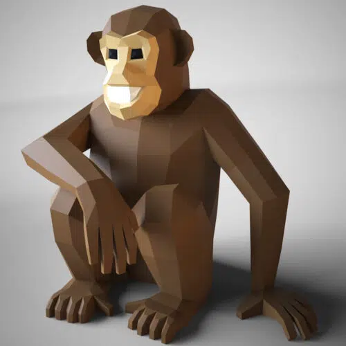 Papercraft chimpanzee monkey sitting in 3D origami