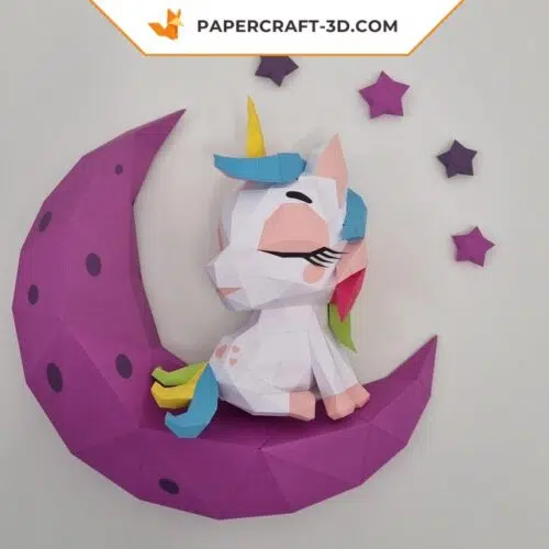 Papercraft baby unicorn on moon in origami