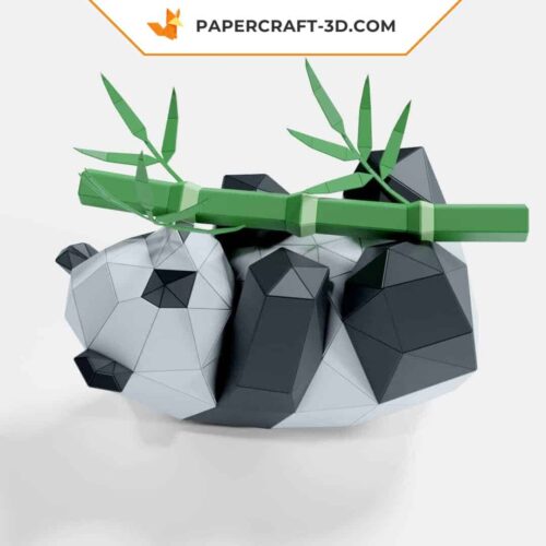 Papercraft panda playing with bamboo in 3D origami
