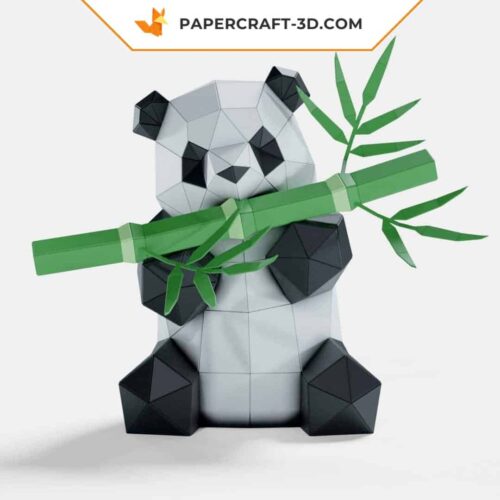 Papercraft panda eating bamboo in origami