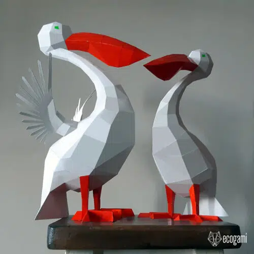Papercraft pelicans in 3D origami